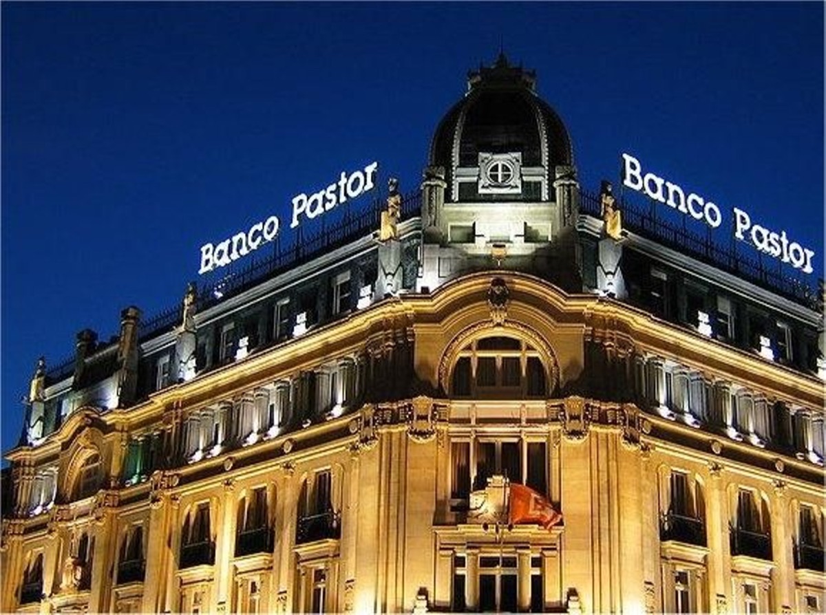 The Banco Pastor headquarters building in A Coruña, floodlit at night